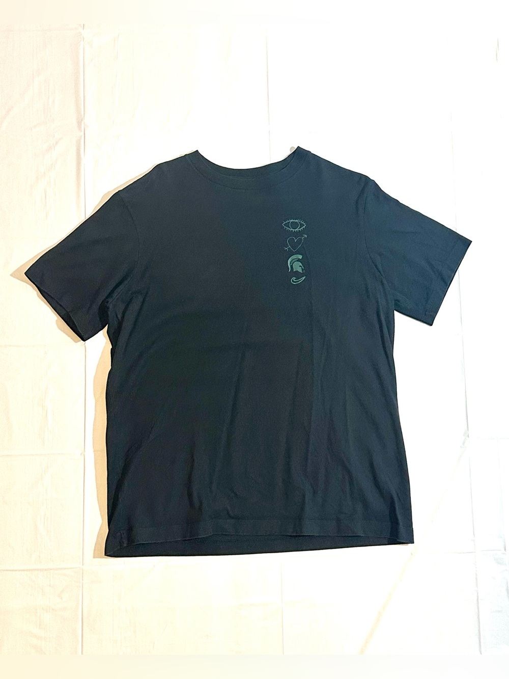 Nike Black Short Sleeve Crew Tee with Small Green Chest Graphic